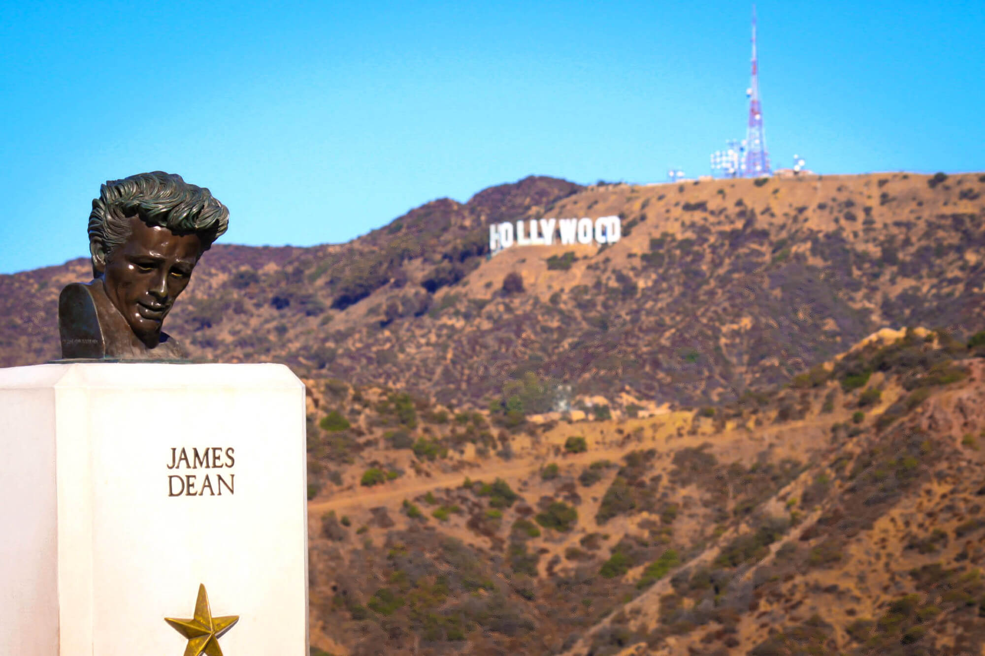 Bust of James Dean with Hollywood sign in background