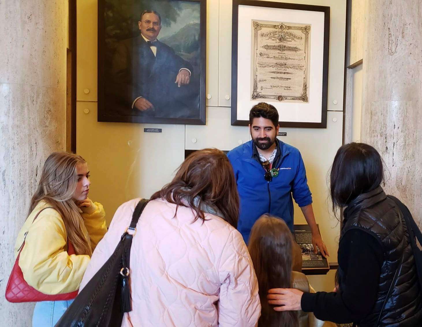 Guide talking to guests in Griffith Park Observatory
