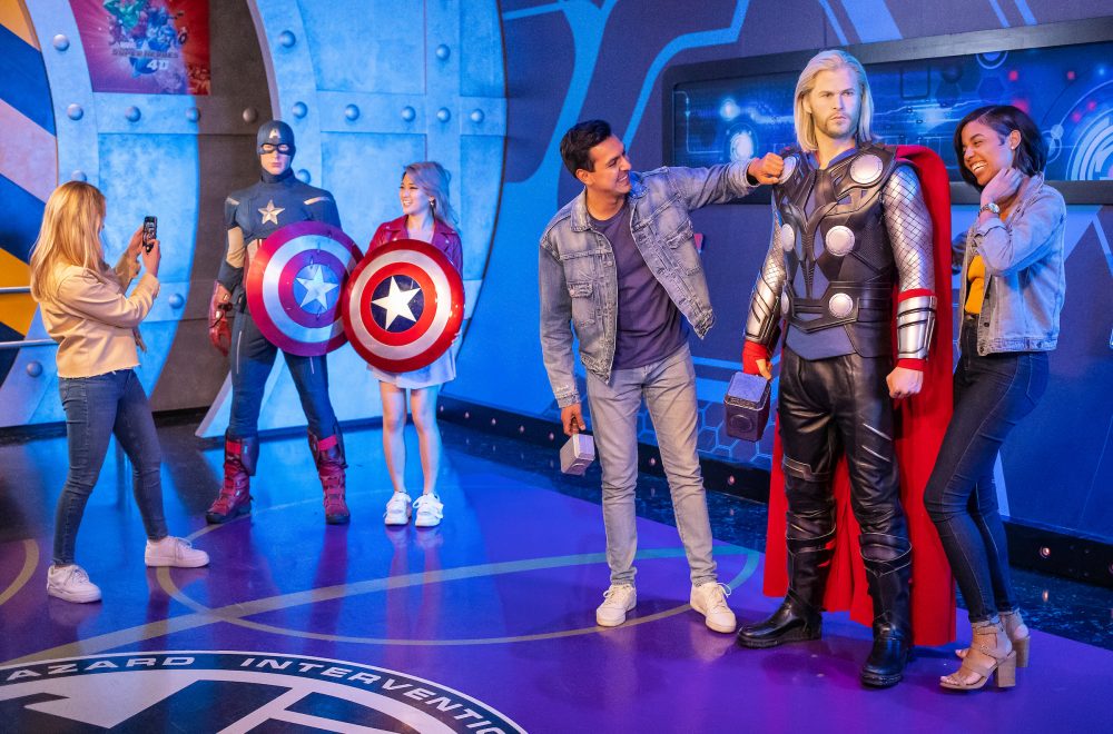 Guests taking photos in Madame Tussauds Hollywood with Marvel superheroes