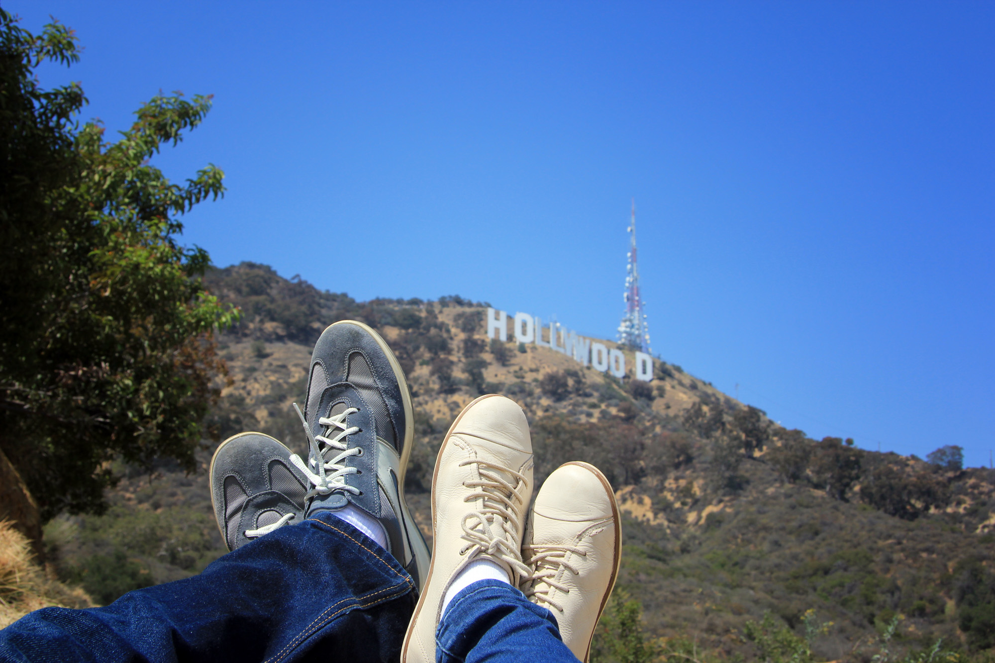 View of Hollywood Sign with sneakers